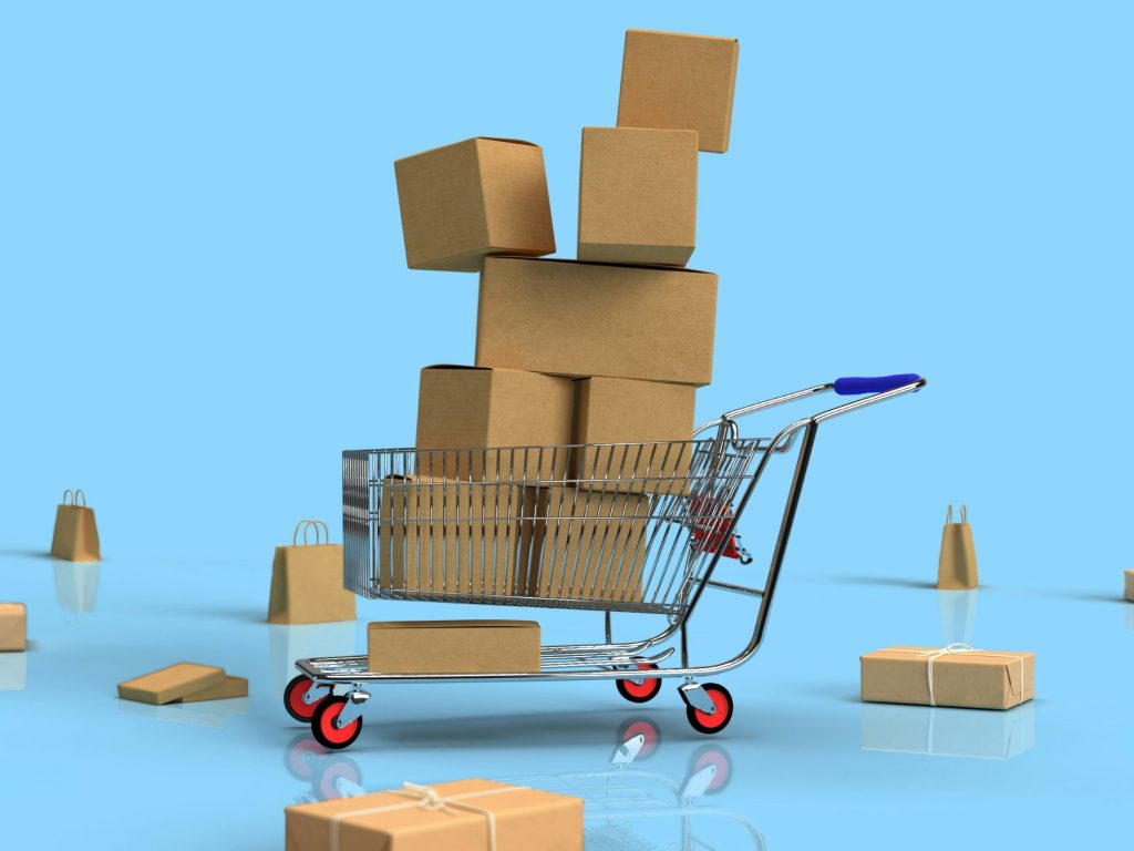 Shopping cart full of gift packages as Shopify is enhancing core enterprise commerce workflows with agentic AI, automating operations while expanding sales channels.